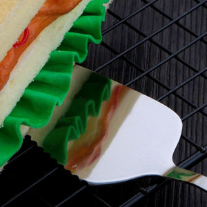 Imagen de Espátula de metal  para torta  con mango de goma