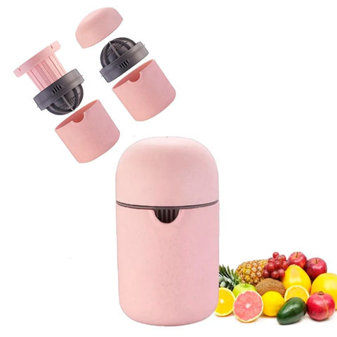 Imagen de Exprimidor manual de jugos con depósito dispensador + mortero 2 en 1