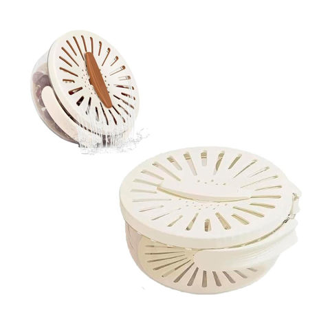 Imagen de Recipiente escurridor de vegetales y frutas  con asa plegable