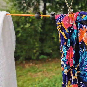 Imagen de Cuerda tendedero elástica retráctil 10 mts - Incluye acces y palillos