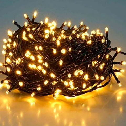 Imagen de Navidad 100 luces arroz blancas- cable 4 mts verde